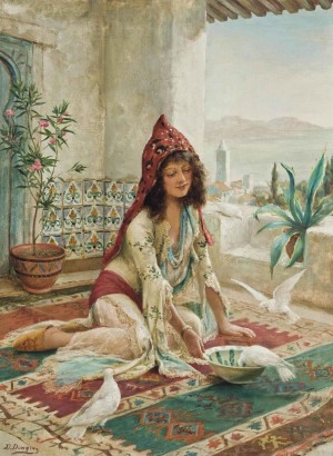 An Oriental woman feeding the pigeons